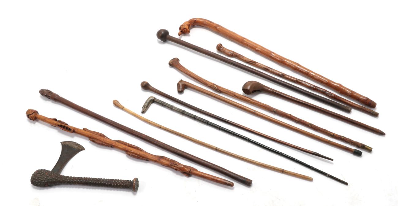 Lot 221 A Shona Axe, with brass stud decoration; A