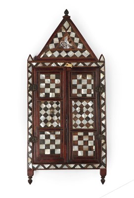 Lot 230 - A Damascus Tortoiseshell, Horn and Mother-of-Pearl Inlaid Toilet Mirror, circa 1900, the triangular