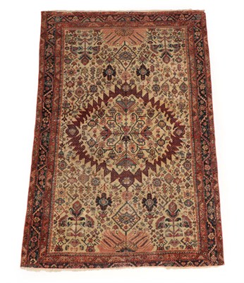 Lot 232 - Mustafi Feraghan Rug West Iran, circa 1890 The cream field with serrated medallions framed by...