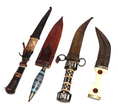 Lot 239 - An Arab Jambiya, 19th century, with bone handle, 26cm long; and Three Various Daggers (4)