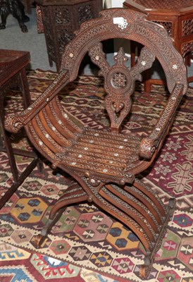 Lot 245 - A Damascus Bone Inlaid Hardwood Savonarola Chair, late 19th century, with arched cresting,...
