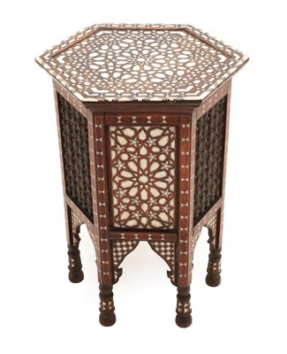 Lot 256 - A Syrian Bone, Mother-of-Pearl Inlaid and Pewter-Strung Occasional Table, circa 1900, the hexagonal