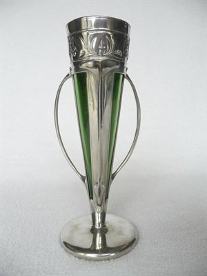 Lot 1465 - A Liberty & Co Pewter and Glass Vase, the pewter pierced and embossed with stylised leaves and...