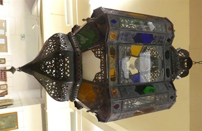 Lot 280 - A Turkish Patinated Brass and Coloured Glass Lantern, late 19th/early 20th century, of square...