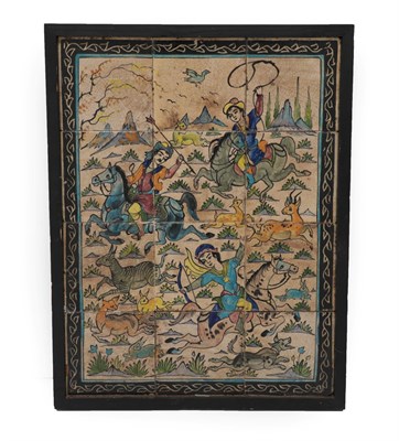 Lot 304 - A Qajar Tile Panel, late 19th/early 20th century, painted with a hunting scene in a mountainous...