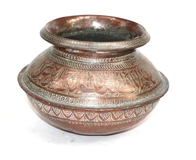 Lot 320 - A Persian Tinned Copper Vase, 19th century, of ovoid form with everted rim, engraved with bands...