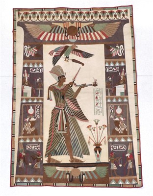 Lot 324 - An Egyptian Patchwork Panel, 20th century, depicting a Pharaoh enclosed by compartmentalised...