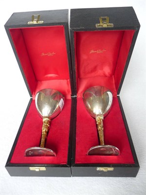 Lot 1472 - Stuart Devlin: A Pair of Silver Wine Goblets, London 1977/8, each with gilt washed bowl, on...