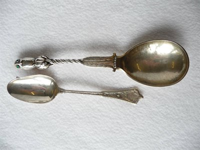 Lot 1475 - A Georg Jensen Silver Owl Serving Spoon, pattern 39, with inset green eyes, London import mark...