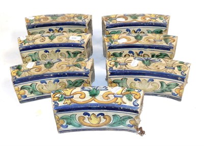 Lot 368 - A Set of Seven Maiolica Curbs, 19th century, painted in colours with scrolls, foliage and...