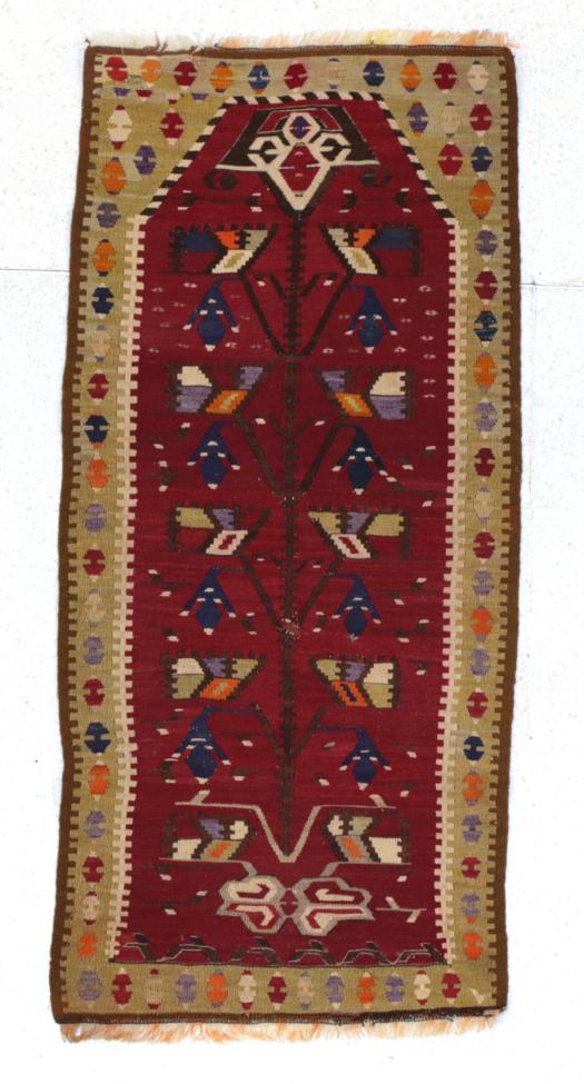 Lot 369 - Thrace Kilim European Turkey, circa 1950 The aubergine field with Tree of Life enclosed by...