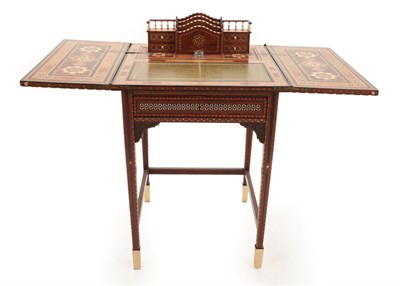 Lot 382 - A Spanish Nasrid Revival Ivory and Bone Inlaid Parquetry Metamorphic Writing Table, probably...