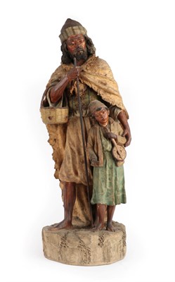 Lot 392 - An Austrian Cold Painted Terracotta Arabesque Figure Group, circa 1900, as a bearded man with a...