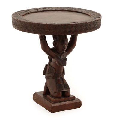 Lot 396 - A West African Stool/Table, with figural support, 42cm by 45cm