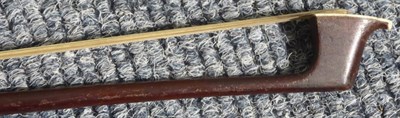 Lot 3035 - Violin Bow stamped 'Pecatte' [sic] ivory frog and button, length excluding button 720mm, weight 59g