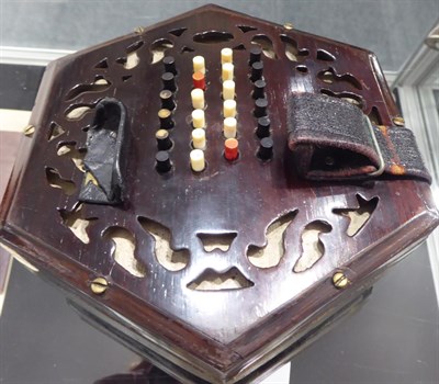 Lot 3049 - Concertina By C Wheatstone 48 button, English system, with label 'C Wheatstone, Inventor, 20...