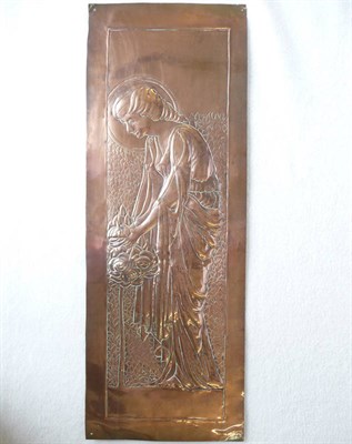 Lot 1486 - An Arts & Crafts Copper Rectangular Plaque, embossed with a young woman tending to stylised...