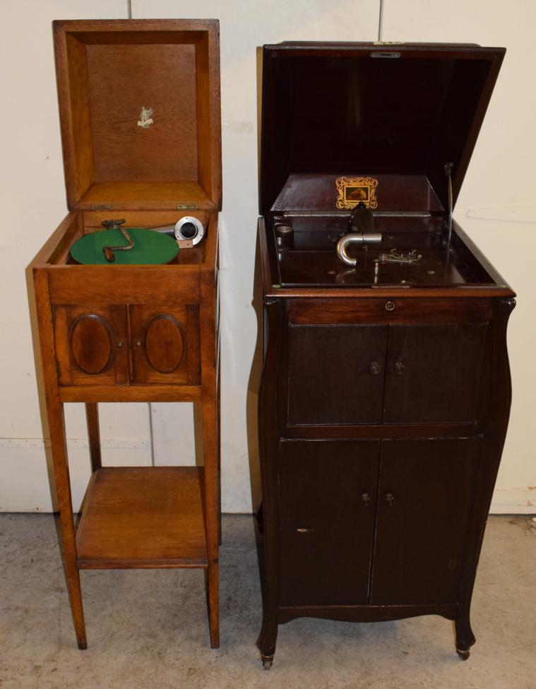 Lot 3107 - An HMV Model 180 Cabinet Gramophone, with record storage racks behind twin doors, below...
