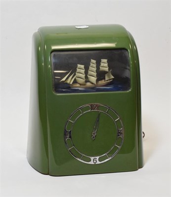 Lot 3146 - Vitascope green Bakelite with clock (lacks one hand) and automated ship