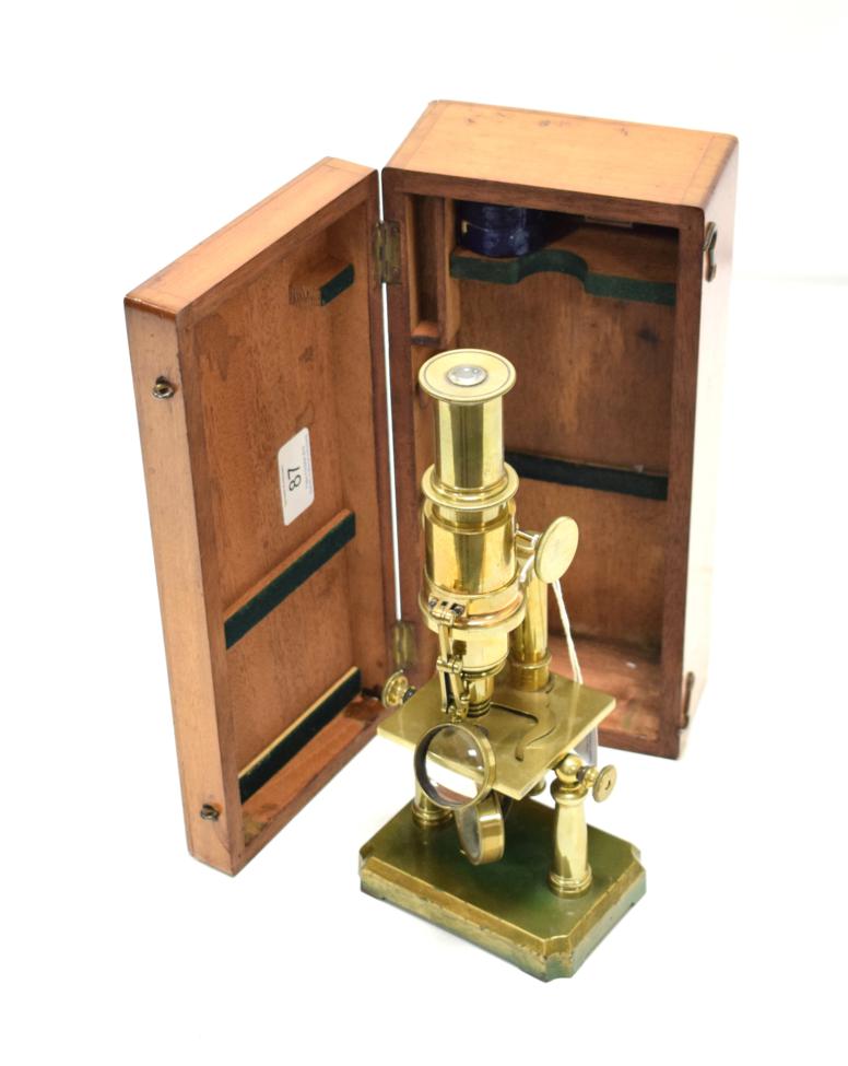 Lot 3150 - Brass Twin Pillar Travelling Microscope with plano-concave mirror, condenser lens, wheel focussing