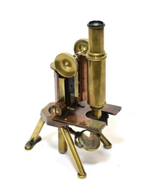 Lot 3152 - J Swift & Son (London) Brass Microscope with course/fine focussing, tripod base (mirror lacks...