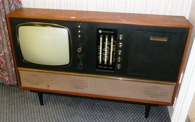 Lot 1495 - A 1950's/60's PYE Cambridge Model 28 Trio Slim Line Television/Radio/Record Player, in a teak...