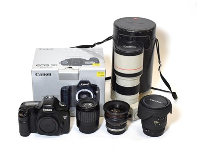 Lot 3167 - Canon EOS 5D Digital Camera Body (some general wear, boxed) together with four lenses: Canon EF...