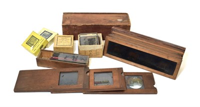 Lot 3191 - Magic Lantern Slides a collections of 27 examples in long retangular frames; together with a...