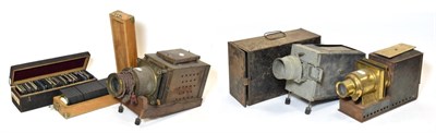 Lot 3195 - Magic Lanterns three examples (a.f) together with two boxes of photographic glass slides