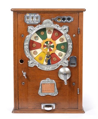 Lot 3205 - Iris Roulette Type Wall Mounted Amusement Machine with three coloured enamelled revolving disc with