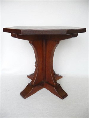 Lot 1502 - A Robert "Mouseman" Thompson Oak Octagonal Coffee Table, on a cruciform base, with carved mouse...