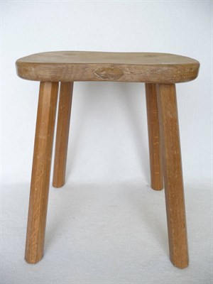 Lot 1506 - A Robert "Mouseman" Thompson Oak Cow Stool, on tapering octagonal legs, with carved mouse...