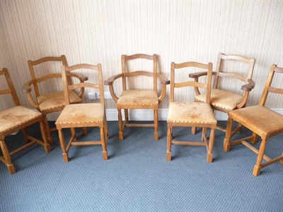 Lot 1511 - A Set of Seven (4+3) Alan Grainger Acorn Industries Oak Dining Chairs, with shaped rails, tan...