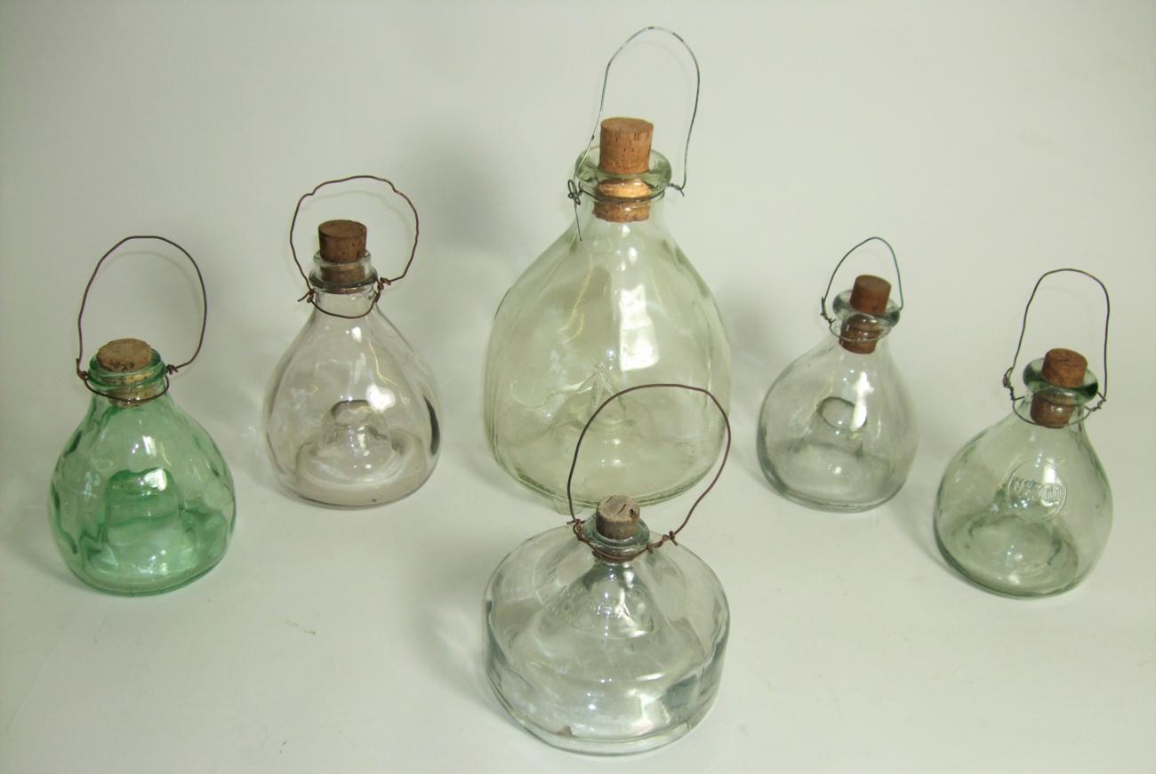 Lot 144 - Collectibles: Six Vintage Blown Glass Wasp Traps, a collection of five various sized glass wasp...