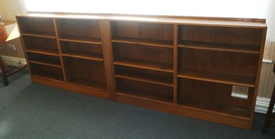 Lot 1515 - An Alan Grainger Acorn Industries Oak Double Fitted Bookcase, with four sections each with...