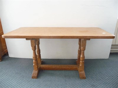 Lot 1522 - A Sid Pollard Oak Coffee Table, with four octagonal legs on two sledge feet joined by a...