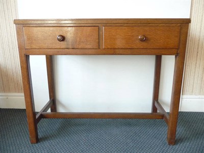 Lot 1530 - A Gordon Russell Oak Side Table, rectangular form above two frieze drawers, on four legs joined...