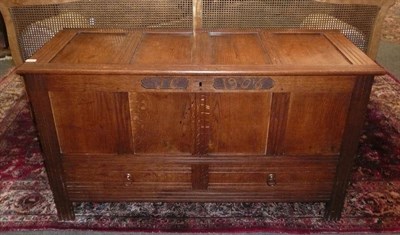 Lot 1531 - An Arts & Crafts Panelled Oak Dower Chest, the front carved with JC and dated 1906, groove...