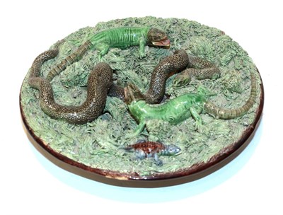 Lot 39 - A Pallisy ware dish depicting snakes and lizards