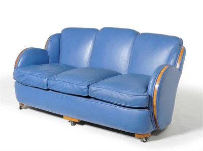 Lot 1535 - An Art Deco Walnut and Blue Leather Three Seater Cloud Settee, unmarked, 166cm wide, 80cm high