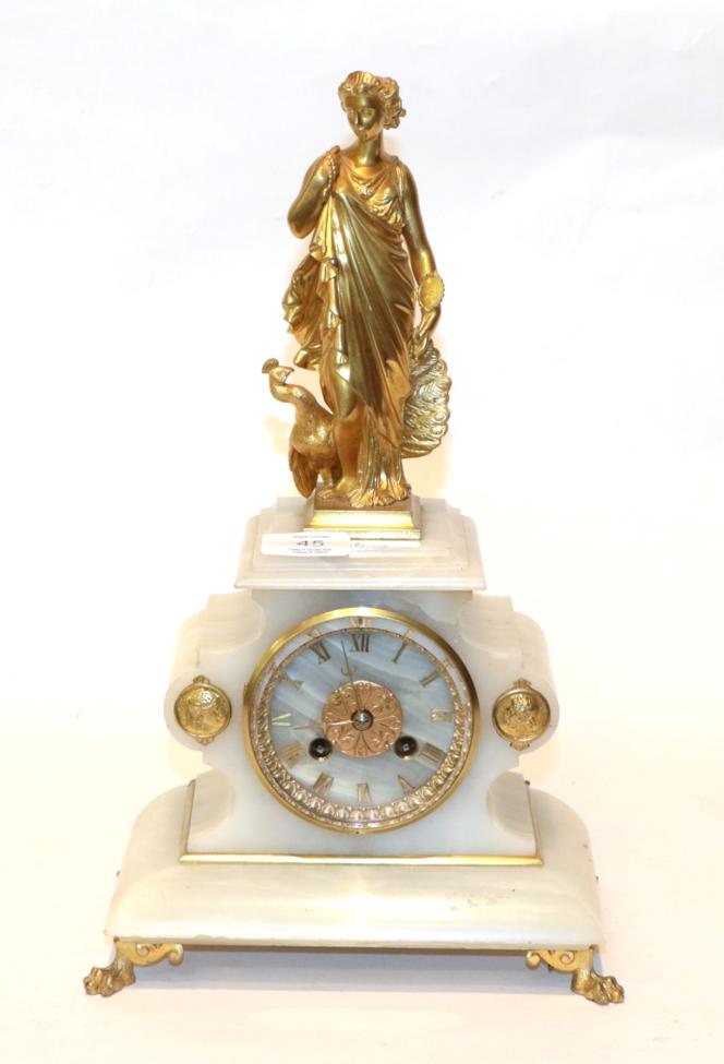 Lot 45 - An onyx striking figural mantel clock