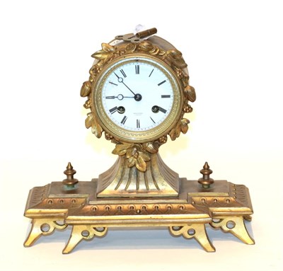 Lot 46 - A gilt metal striking mantel clock, retailed by Wheatley, Carlisle