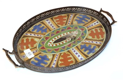 Lot 63 - A Dutch Arnhem pottery oval tray, metal frame