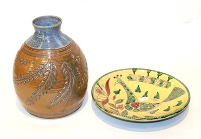 Lot 65 - A Cloud Pottery vase; together with a heavily glazed charger (2)