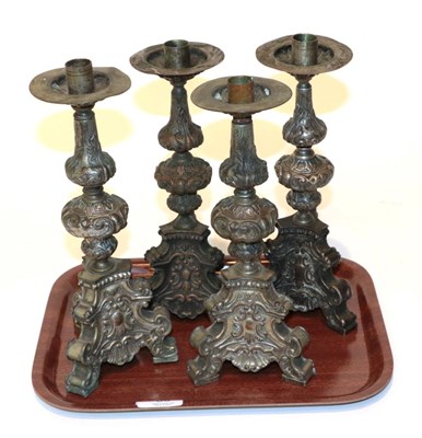 Lot 89 - Four silver plated church candlesticks