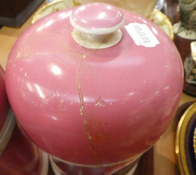 Lot 98 - Three 19th century porcelain apothecary jars and covers with titled plaques, pink ground...