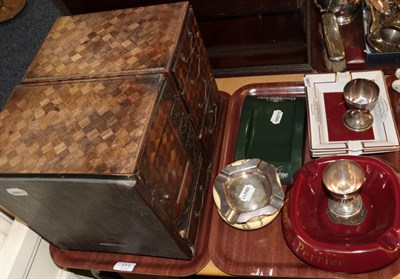 Lot 111 - A pair of parquetry collectors cabinets and champagne ash trays; silver cups; and an ash tray...