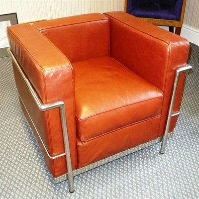 Lot 1542 - A Modern Le Corbusier LC2 Club Chair, polished chromed steel frame with tan/brown  leather...