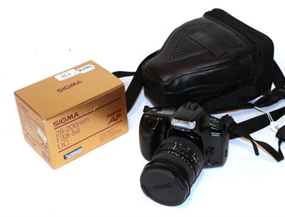 Lot 132 - Minolta 35mm Dynax 300si camera including two sigma lenses