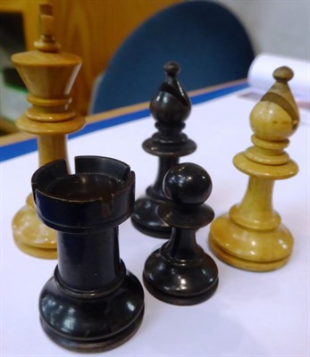 Lot 133 - A complete ebony and boxwood chess set, late 19th/early 20th century, boxed; together with a...